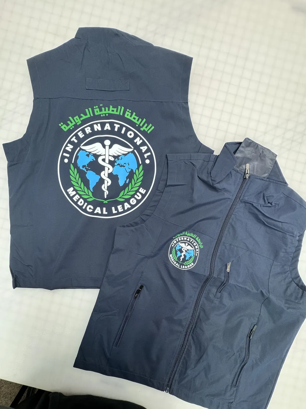International Medical League – Embroidered-look vests